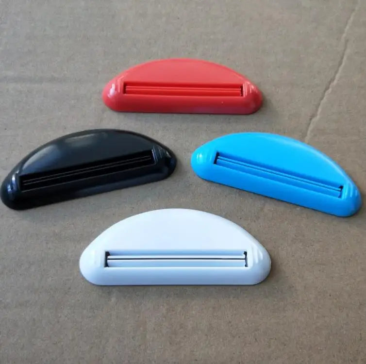 Custom Logo Pushing Save Plastic Toothpaste Tube Squeezer for Hair Salon Toothpaste Dispenser Clips Holders