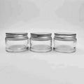 Wholesale Low MOQ 1oz 2oz Glass Cosmetic Container Clear Amber Glass Jar with Aluminium Metal Lid Screen Printing Screw Cap