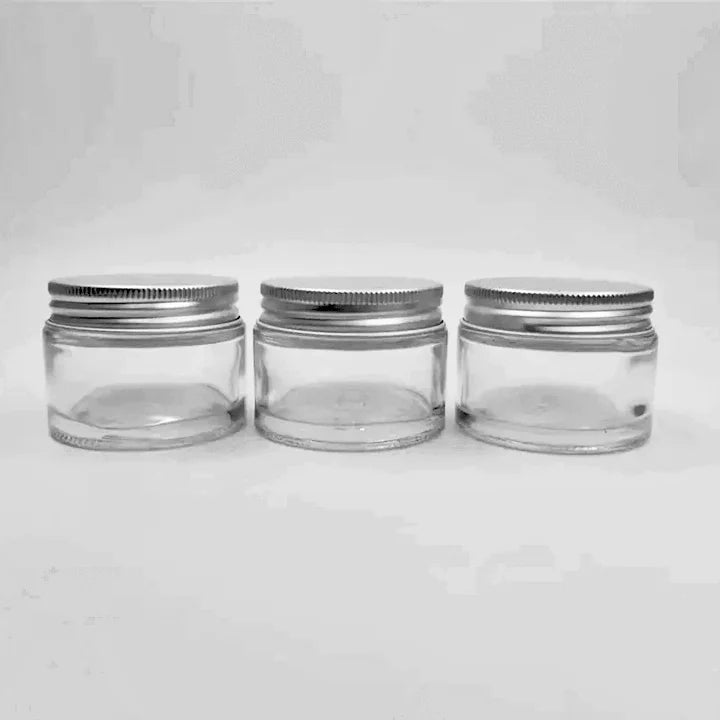 Wholesale Low MOQ 1oz 2oz Glass Cosmetic Container Clear Amber Glass Jar with Aluminium Metal Lid Screen Printing Screw Cap