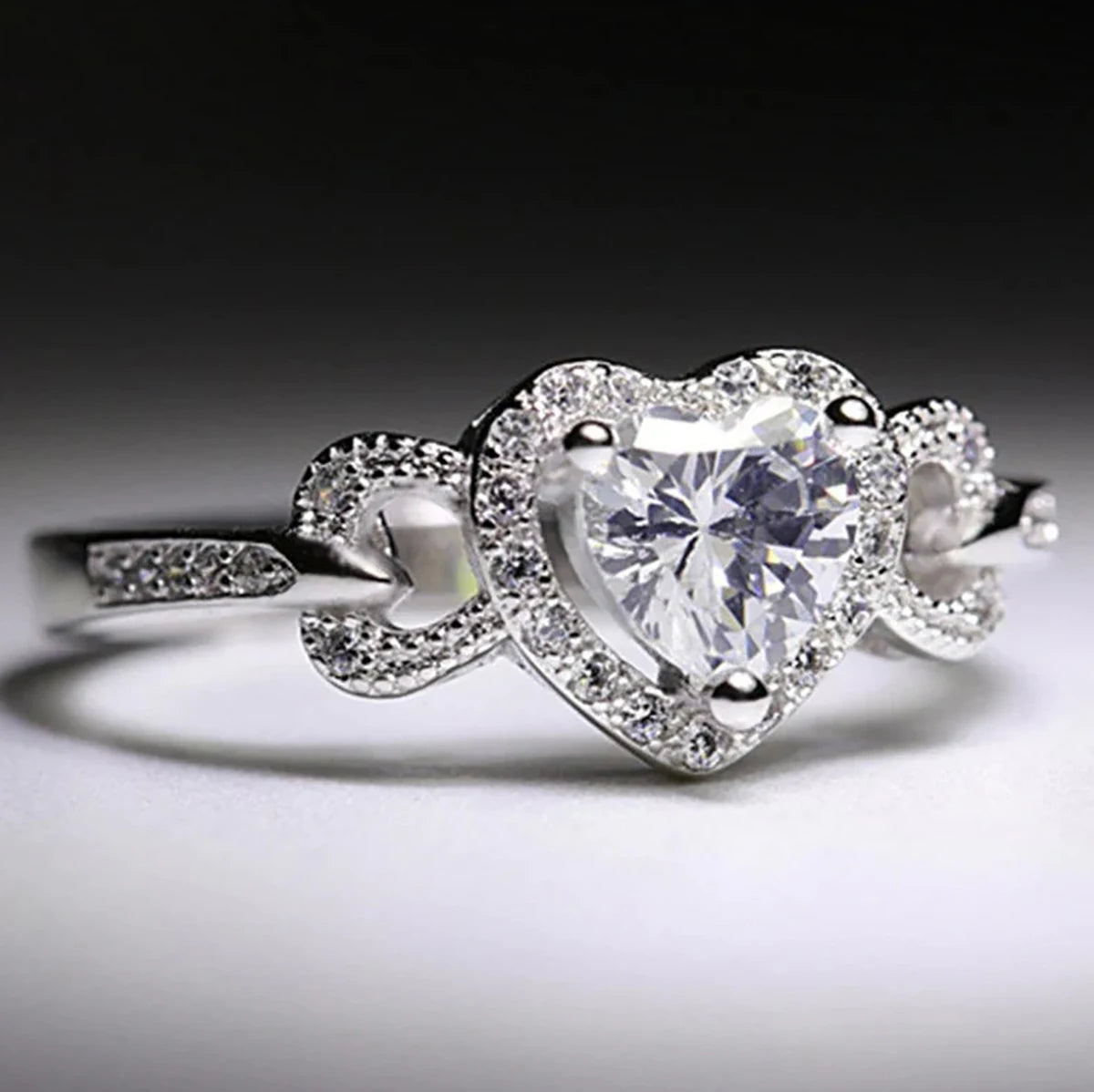 CAOSHI OEM Gorgeous Heart Design White Crystal Full Paved Imitated Moissanite Hollow Rings for Wedding Silver Plated Rings Women
