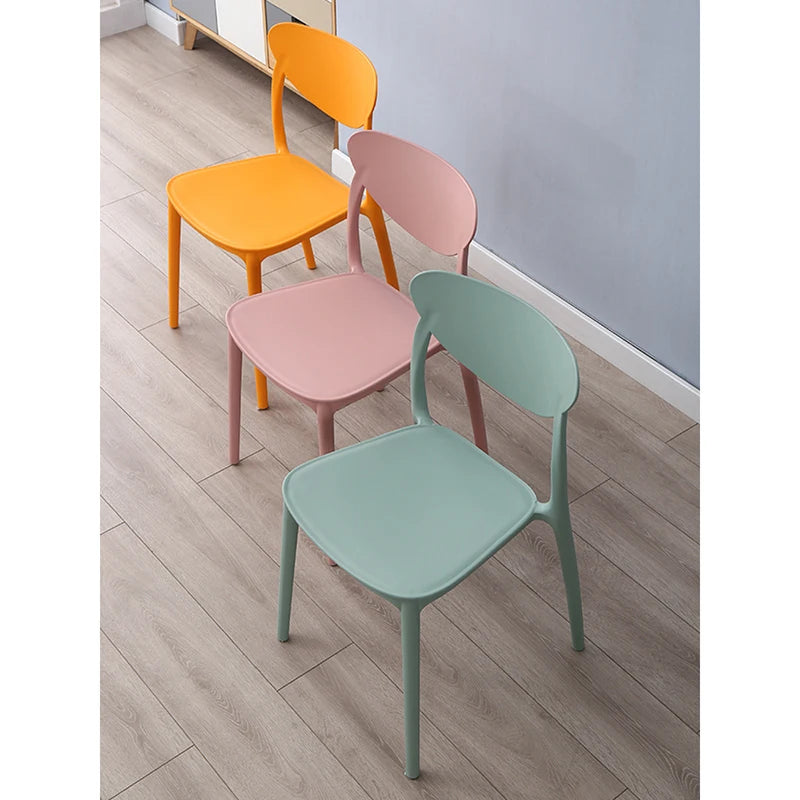 Eco-Friendly Colorful Restaurant Plastic Chairs for Dining and Hotel Customized Stackable Plastic Chair Living Room Furniture