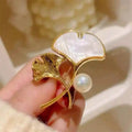 High-End Luxury Ginkgo Leaf Design Brooch Inlaid with 7-8mm Freshwater Beads and Natural Seawater Mother Shell for Weddings