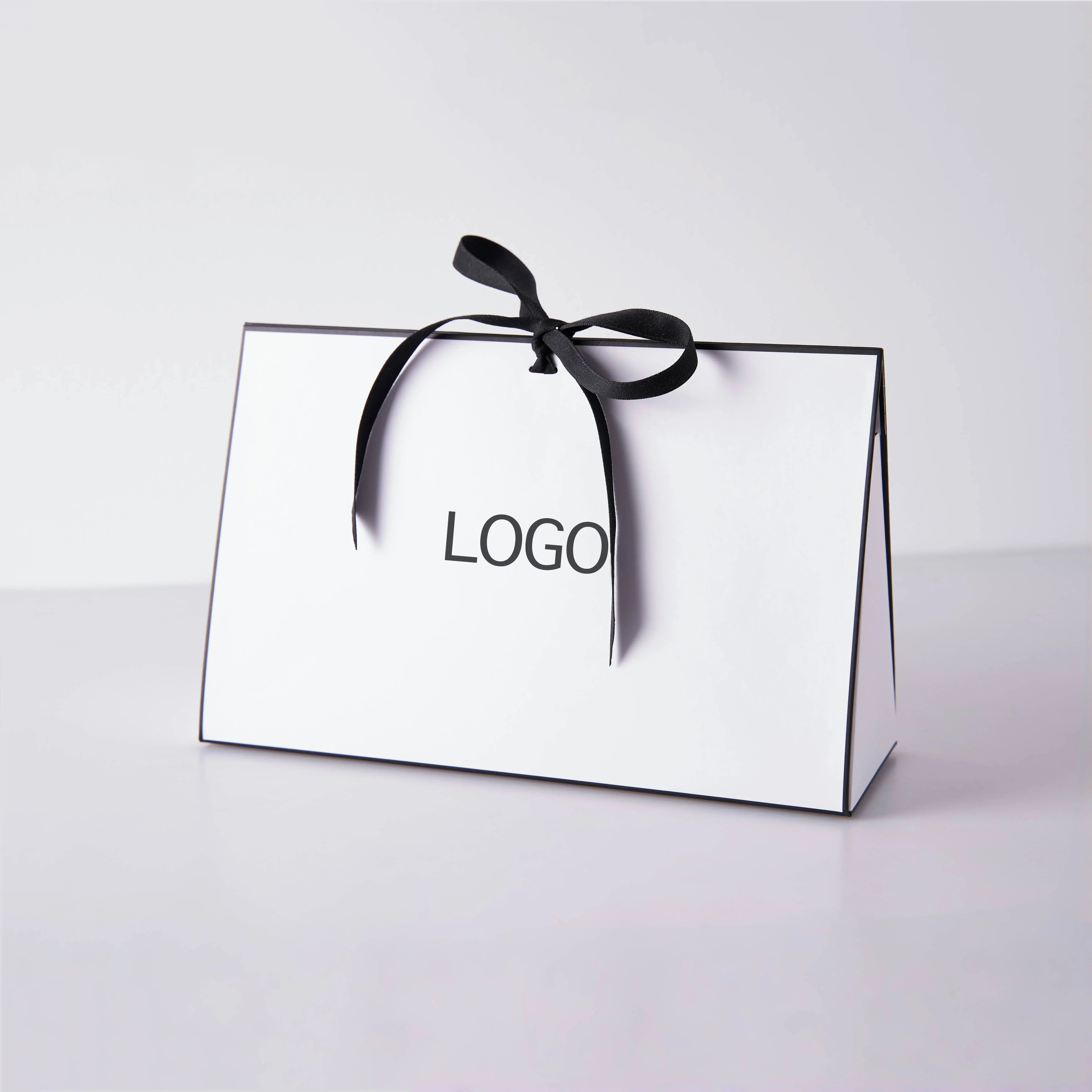 Custom Printing logo Luxury Recycled Shopping Bags Gift Cardboard Paper Packaging Bag With Ribbon Bow