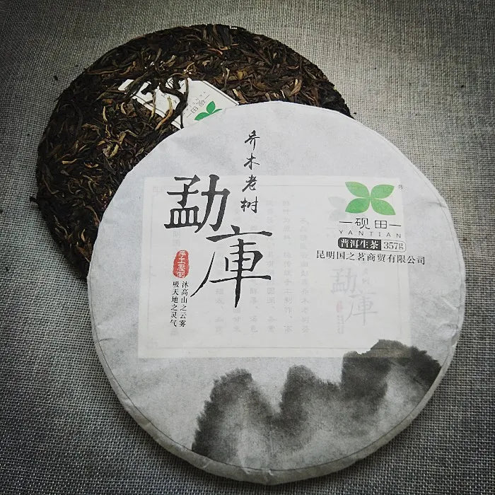China Old Tree Pu'er Tea Cake Raw Puerh Tea with Cheap Price