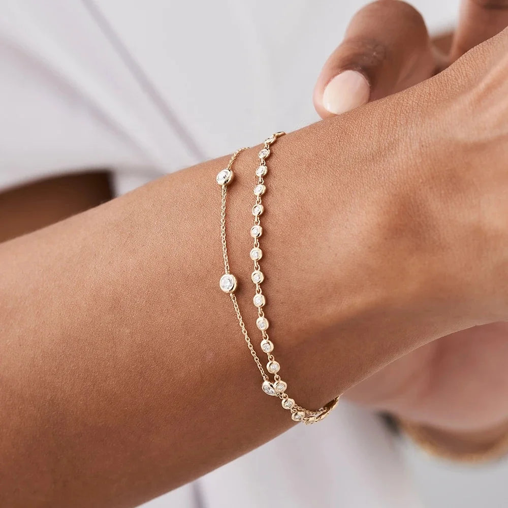 Wholesale 18K 14K Gold and Rhodium Plated Tennis Bracelet with Zircon and Diamond Classic Bezel Setting for Parties and Gifts
