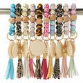 2025 Womens Keyrings Monogram Wood Blank Disc Wristlet Key Ring Holder Silicone Bead Tassel Bracelet Bangle Keychain
