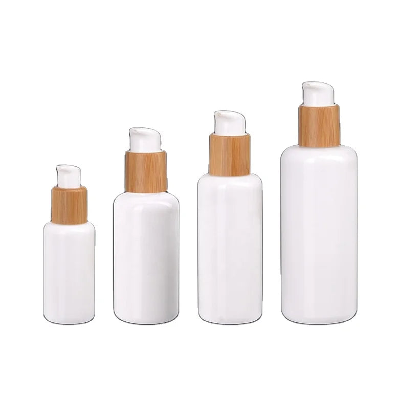 2022 Sample Manufacturer Wholesale Luxury Refillable Custom Press Pump 30ml 50ml 100ml Emulsion Bottles with Bamboo Cap