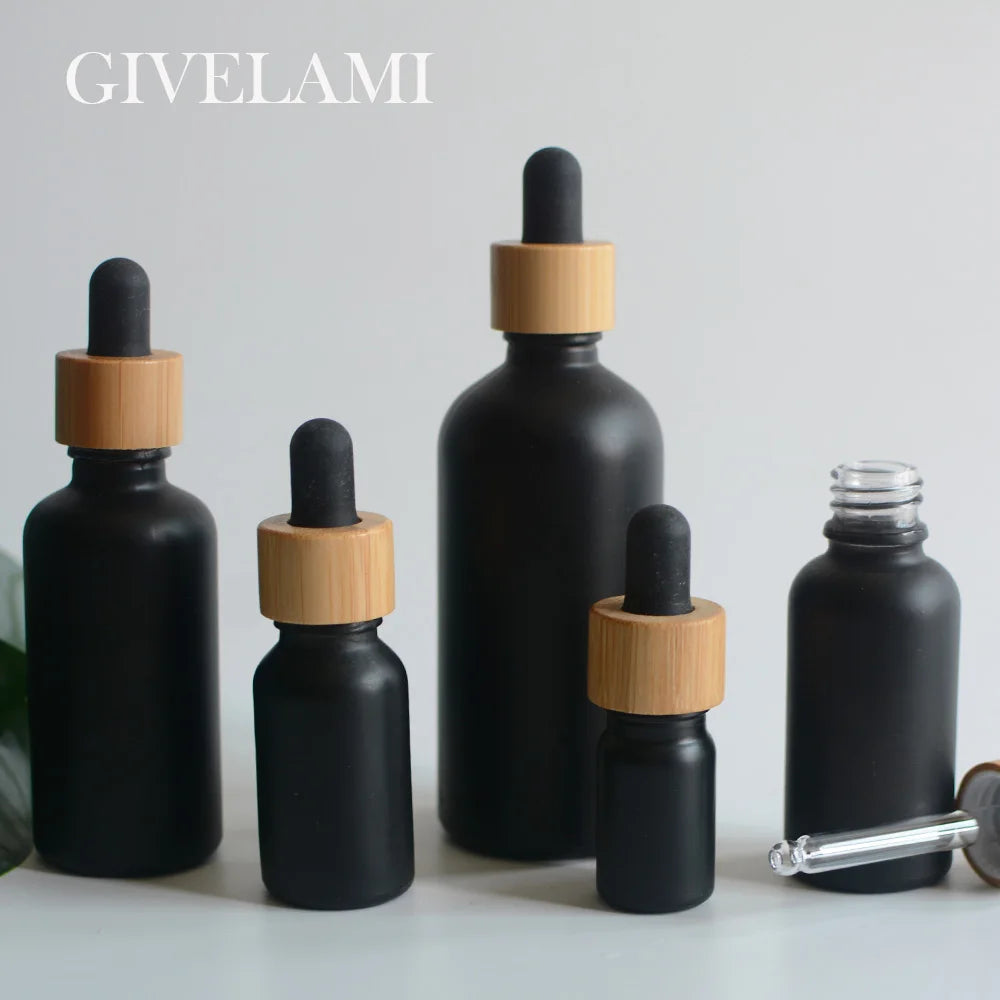 Wholesale 5ml 15ml 30ml 50ml 100ml  Matte Black Glass Essential Oil Serum Dropper Bottles With Bamboo Wooden Lid for Skincare