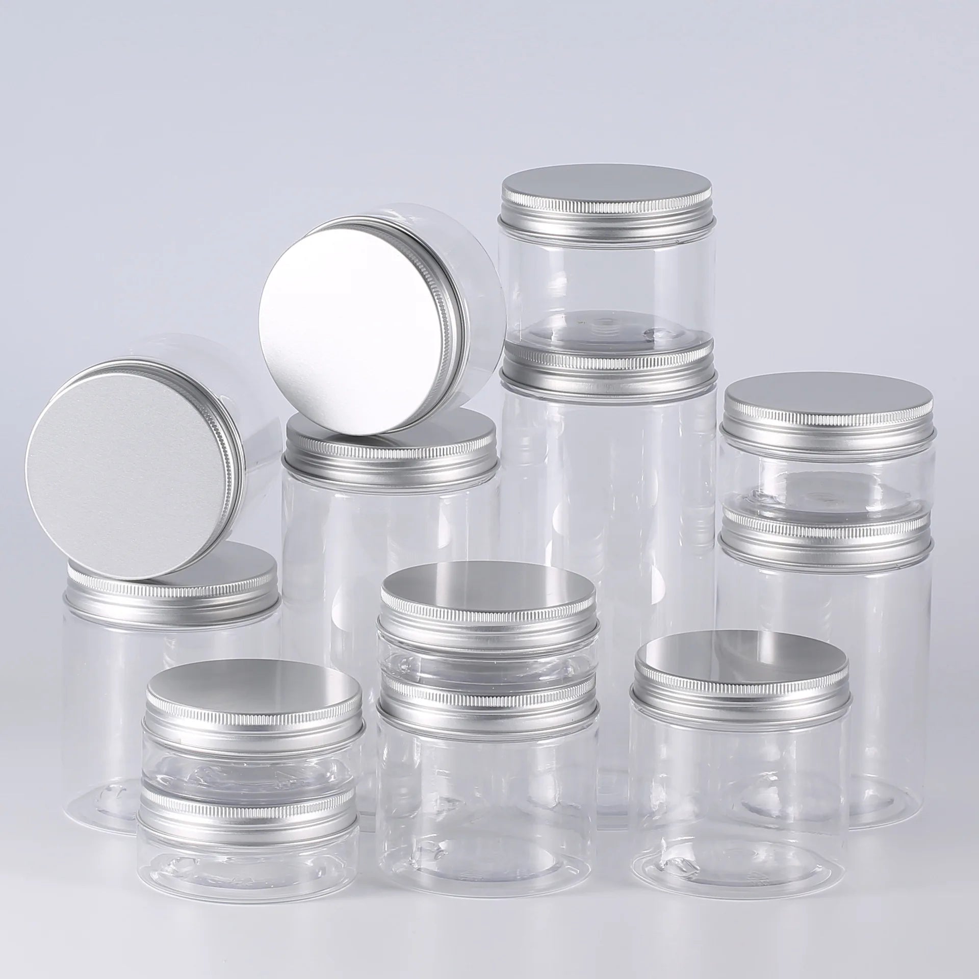 Wholesale Clear Plastic Cosmetic Cream Jars with Aluminium Lids Food Storage and Skin Care Container for Lotion Storage