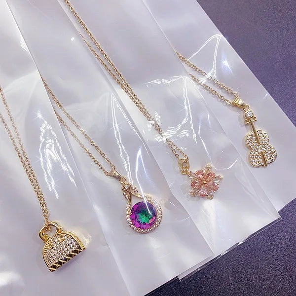 Mixed Wholesale Light Luxury Multi Designs Fashion Super Flash Zircon Pearl Four-Leaf Clover Flower Butterfly Pendant Necklace