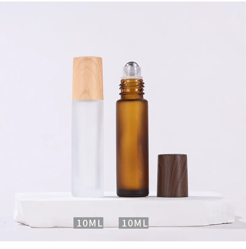 Ready to Ship Dark Wooden Cap Empty Glass Steel Roller clear Frosted Amber 10ml Roll on Bottle for Essential Oil