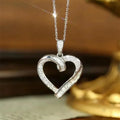 Huitan Exquisite Heart Shaped Full Imitated Diamond Hollow Necklaces for Fashion Jewelry Silver Plated Pendant Necklaces Women