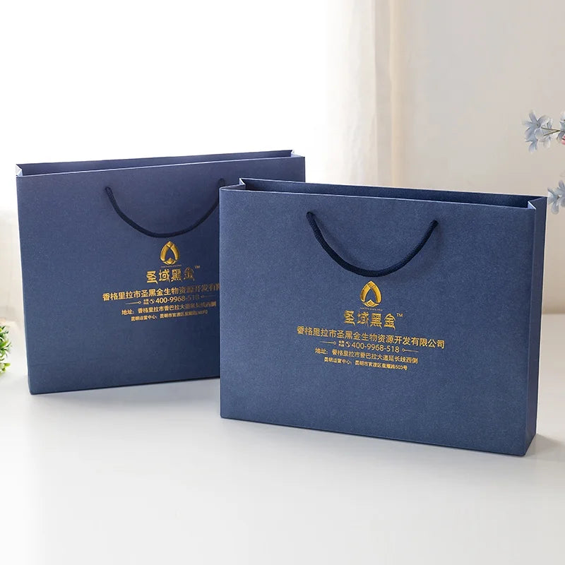 Customized Black Gold Stamping Ecofriendly Recyclable Lamination Foldable Reusable C2S Art Paper Candle Shopping Gift Bags