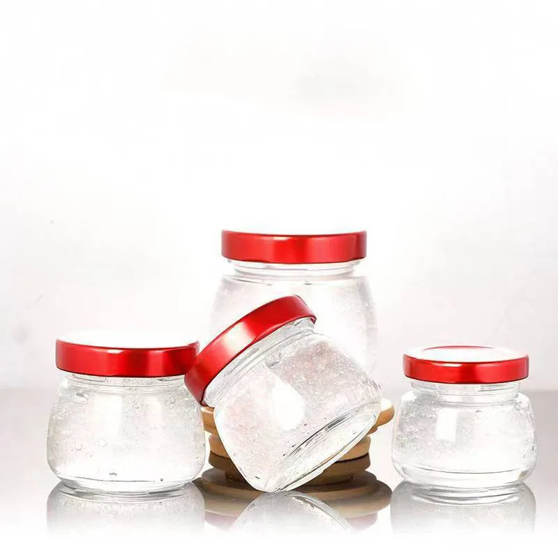 Free Sample 50ml 75ml 100ml 150ml Wholesale Small Round Honey Storage Bird's Nest Glass Bottle Glass Jar With Lug Cap