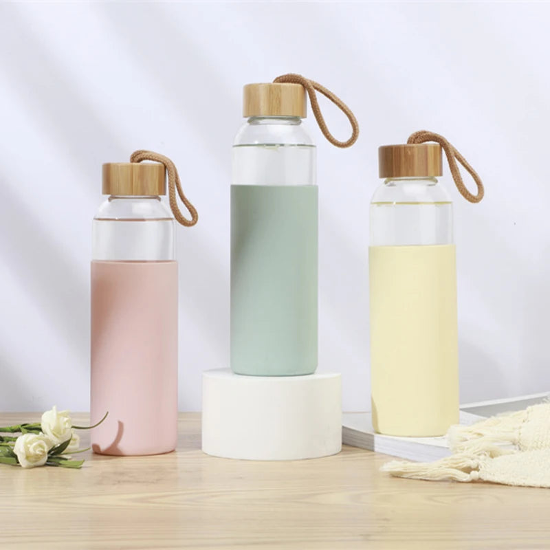 Custom Clear Borosilicate Glass Water Bottle with Bamboo Lid Direct Drinking and Boiling Water Applicable for Camping