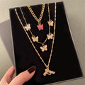 VKME Bohemian Gold Layered Chain Necklace Trendy Butterfly Gun Snake  Locket Pendant Necklace for Women Gifts Jewelry