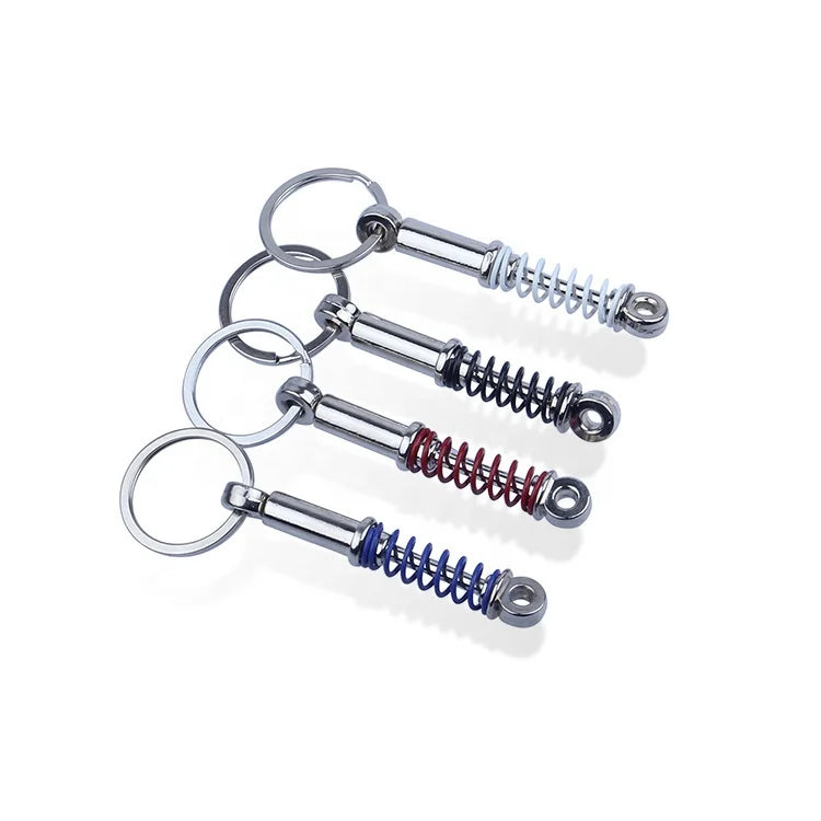 Wholesale Metal Car Shock Absorber Keychain with Turbo Spring Design UV Offset Silk Screen Enamel Printing for Gift Giving