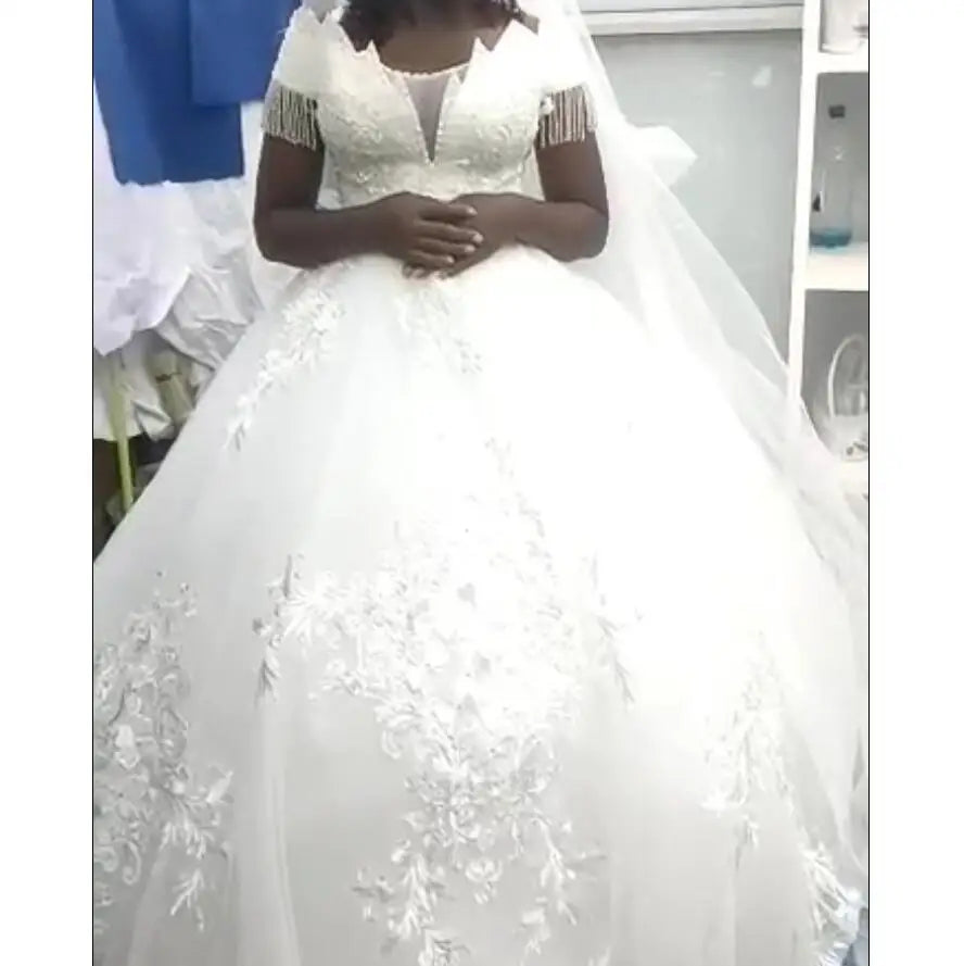 2024 New Arrival Favorable Customize Pure White Off Shoulder African Floor Length Ball Gown Wedding Dress With Tassel Sleeves