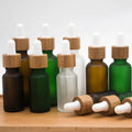 5ml 10ml 15ml 20ml 30ml 50ml 100ml Frosted Glass Essential Oil Dropper Bamboo Cap Avoid Light Round Bottles with Bamboo Dropper