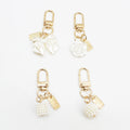 Jachon Alloy Rose Bow Pearl Tassel Car Pendant Ladies Key Chain Bag Pendant
