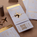 Passport Destination Wedding Invitation in White With Gold Foil Boarding Pass Mirror Acrylic Airplane Tags