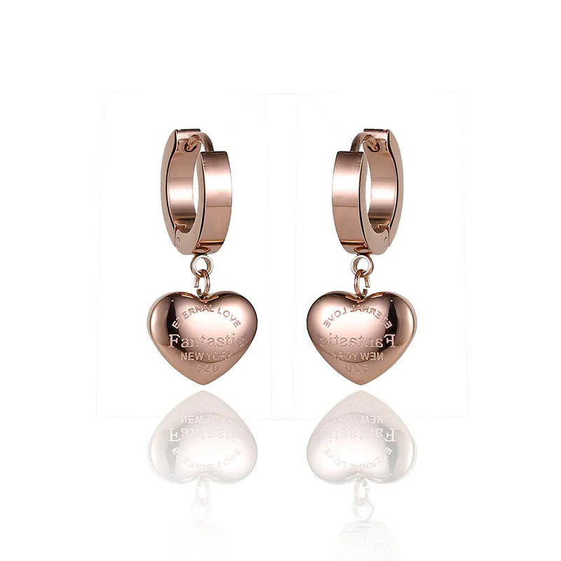 Wholesale Luxury Women's Stainless Steel Engagement Anniversary Drop Earrings Featuring Eternal Design and Heart Dangle MegaBDM