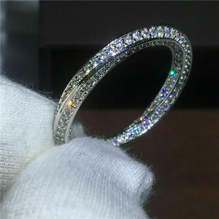 Huitan Exquisite Eternity Bridal Wedding Band Silver Plated Inlaid One Row Round Diamond Engagement Women Rings