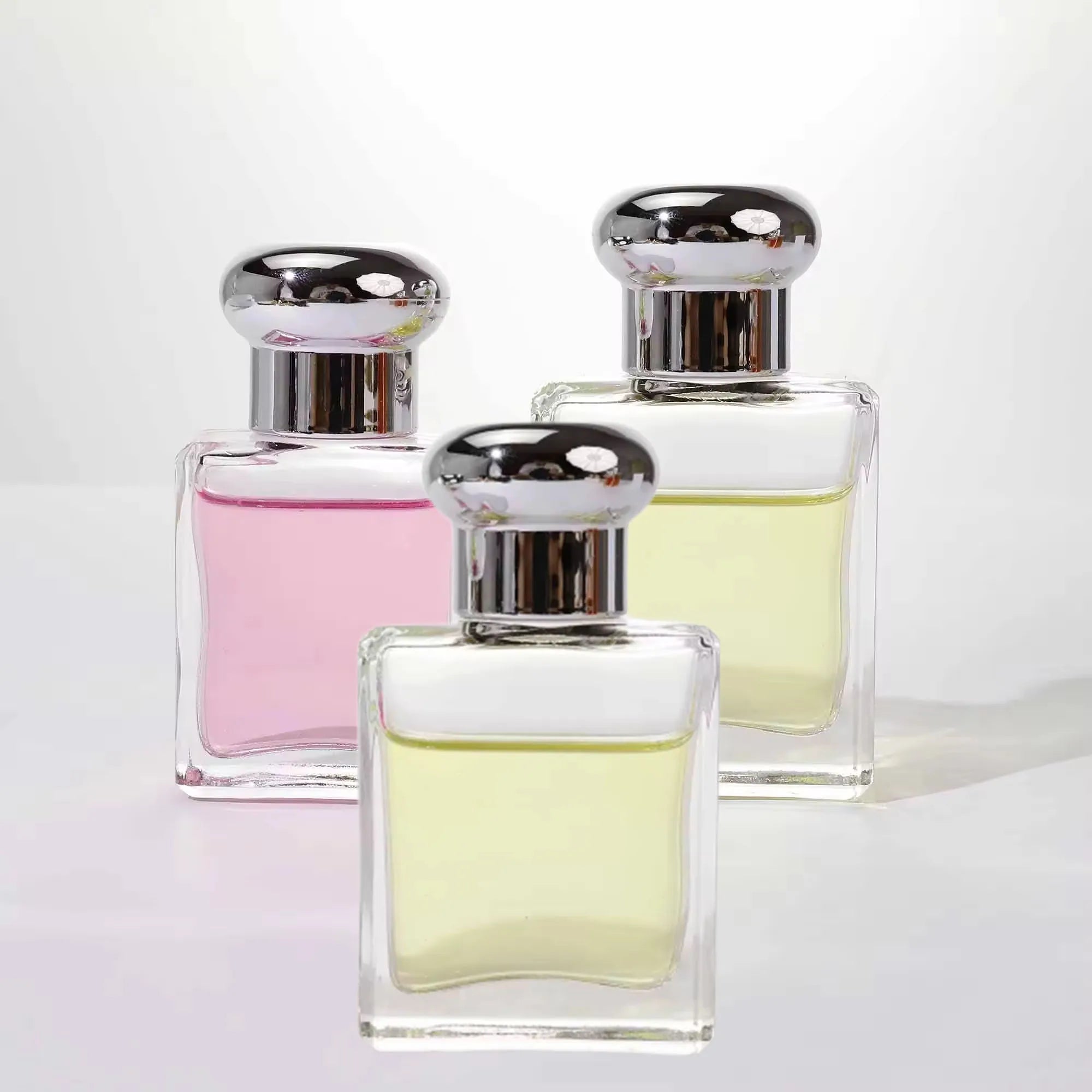 Hot Sale Square Cosmetic Spray Pump Bottle 30ml 50ml 100ml Refillable Empty Perfume Oil Bottle Packaging