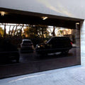 Modern Side Bifold Garage Door New Design Aluminum Folding Steel Door Automatic Open Anti-Theft Feature Home Application Motor