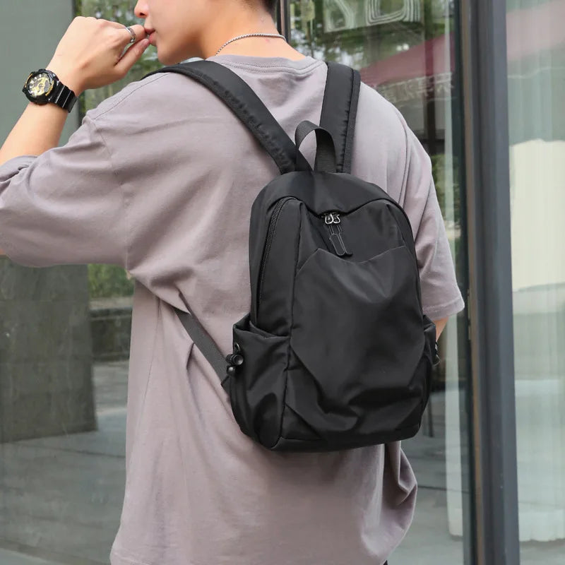 Lightweight Men's Mini Backpack Simple Casual Travel Bag with Zipper Closure Durable Breathable Portable for School or Travel