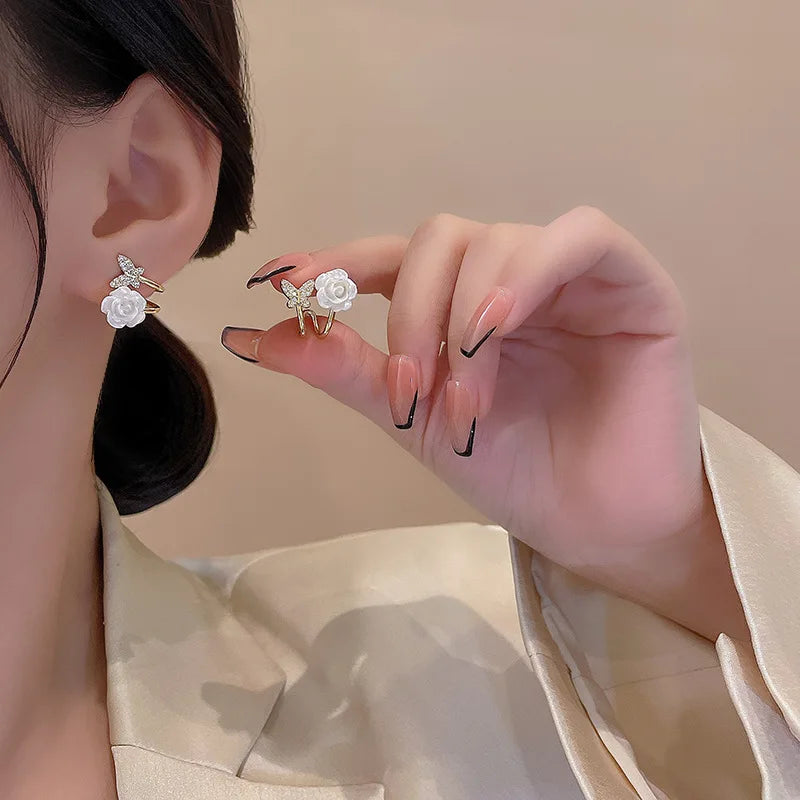 Light Luxury Elegant White Flower Personalized Zircon Earrings for Women Ear Claw S925 Silver Needle Micro-set Butterfly Earring