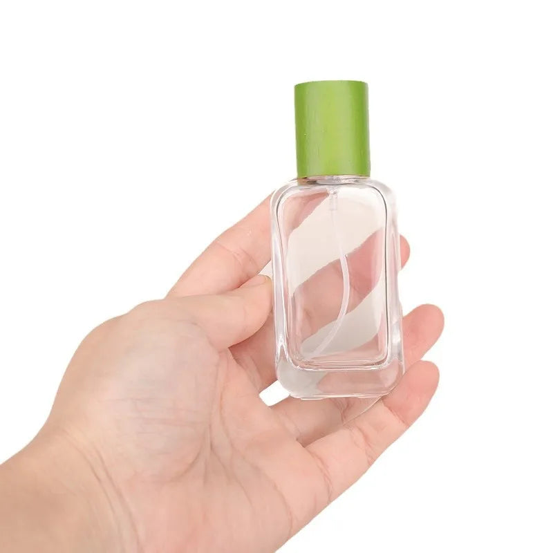 30 ml Minimalist Glass Perfume Bottle 1 oz Sleek Silhouette Atomizer With Label Glass Perfume Jar Customize Green Wood Cover