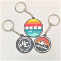 Manufacturer Wholesale 2D Embossed Letter Pattern Round Shape Customize PVC Rubber Soft Key Chains With Silver Key Ring
