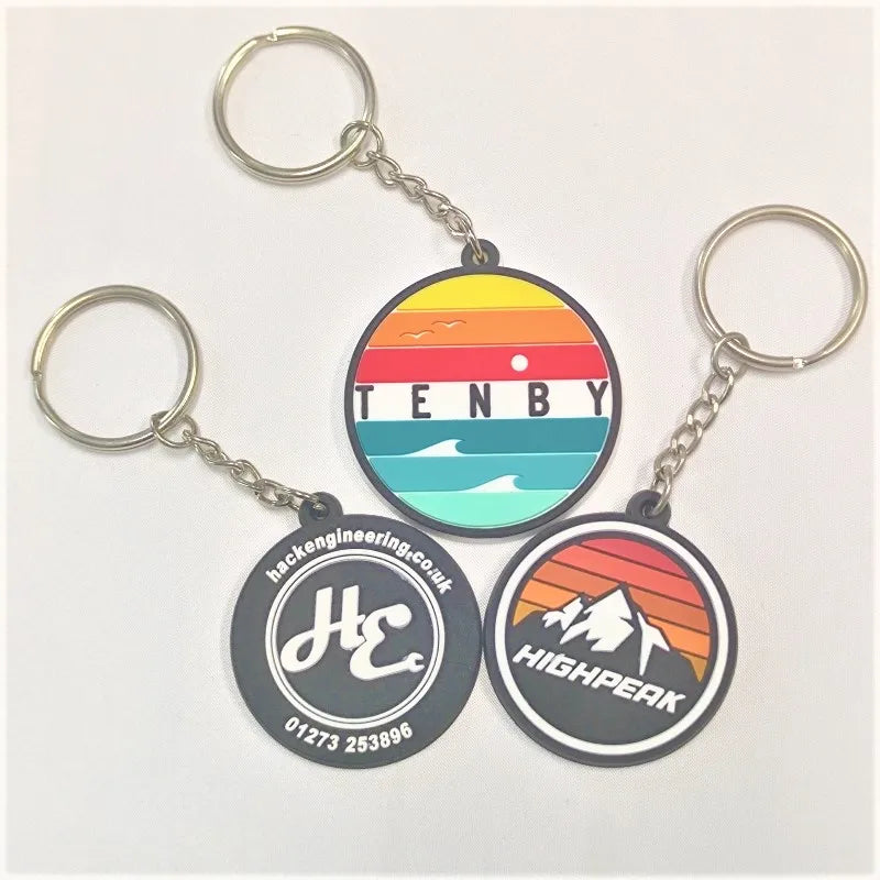 Manufacturer Wholesale 2D Embossed Letter Pattern Round Shape Customize PVC Rubber Soft Key Chains With Silver Key Ring
