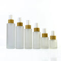 Hot Sale 100ml 120ml 150ml Bamboo Spray Lotion Pump Flat Shoulder clear Frosted Glass Bottle