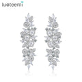 LUOTEEMI Rhodium Plated Silver Color Long Flower Zirconia Diamond Tassel Earrings for Women 2027 Macrame Fringe Leaves Earring
