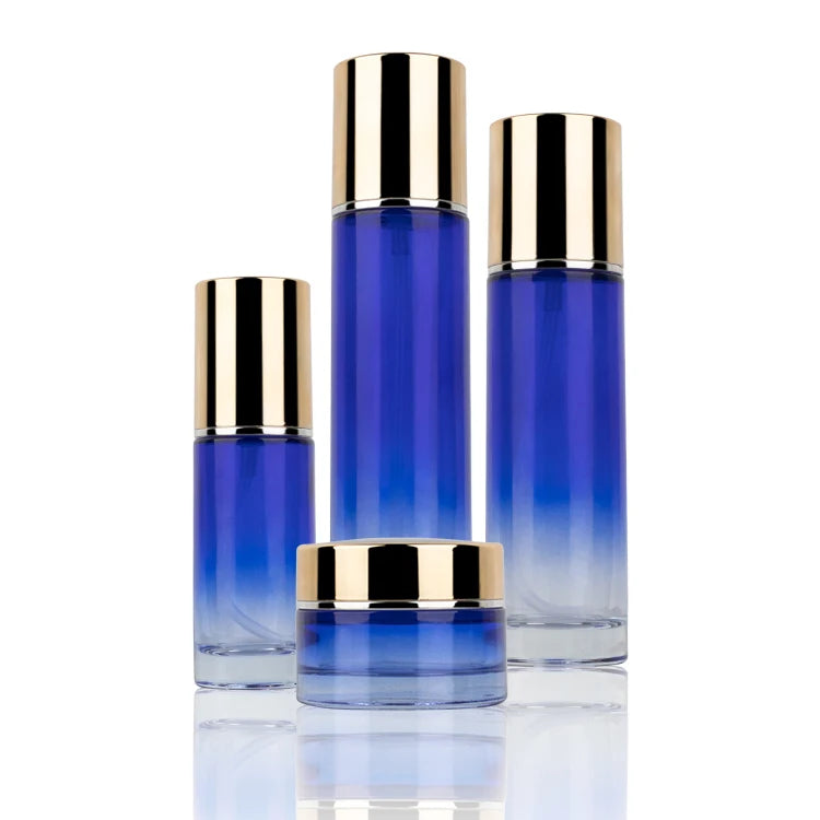 Wholesale Luxury Blue Glass Cosmetic Skincare Pump Bottle Packaging Lotion Bottles and Jars Set