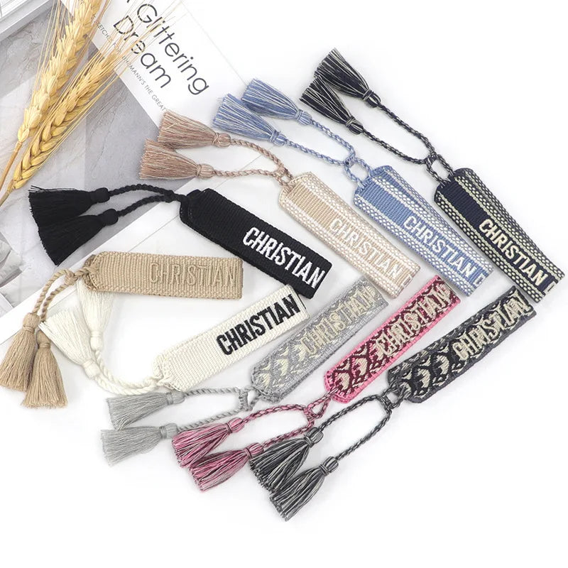 Jingcan crystal 90 colors  Cotton Woven embroidery Bracelets with tassel friendship letter design woven bracelet