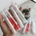 Popular Lip Filler Gloss Custom Logo Shiny White Pink Vegan Lip Plumper Gloss