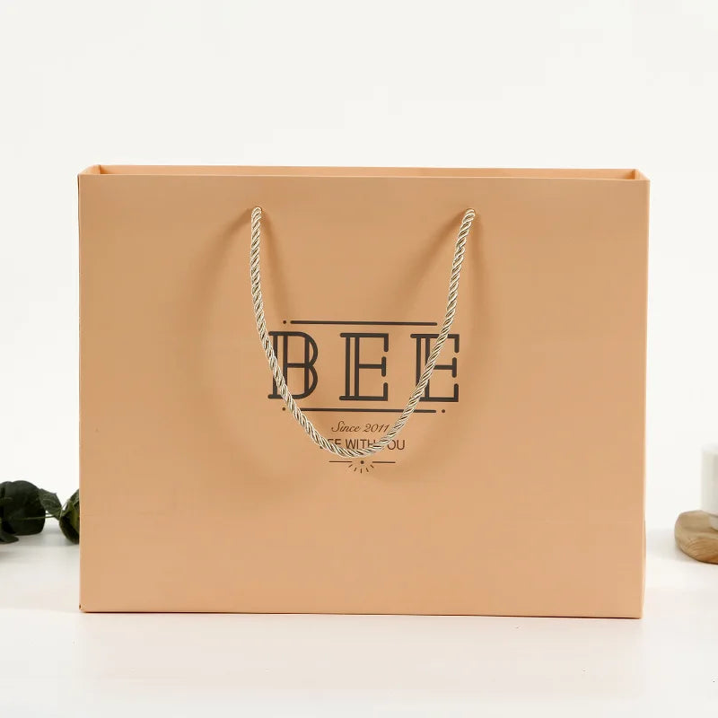 Retail Store Gift Bags With Logo Coated Paper Best Quality Cosmetic Jewelry Paper Shopping Gift Bag With Logo