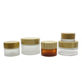 Customized Color LOGO Labels 30g 50ml 100ml Empty Bamboo Lid Amber Clear Frosted Face Body Cream Cosmetic Glass Cream Jar