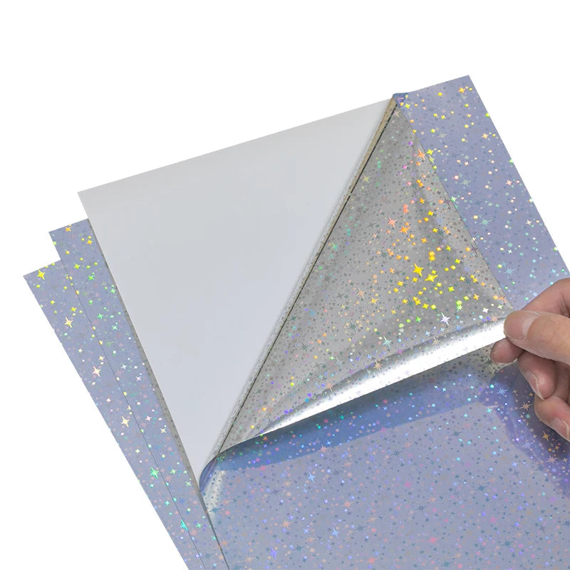 Factory Wholesale PVC Self Adhesive Shiny Stars Pattern Holographic Film Waterproof UV Coated Inkjet Vinyl Sticker Candle Craft