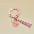 Custom Popular Silicone Bead Wristlet Keychain Mama Bracelet Keychain With Tassel Heart Print Disc Charm