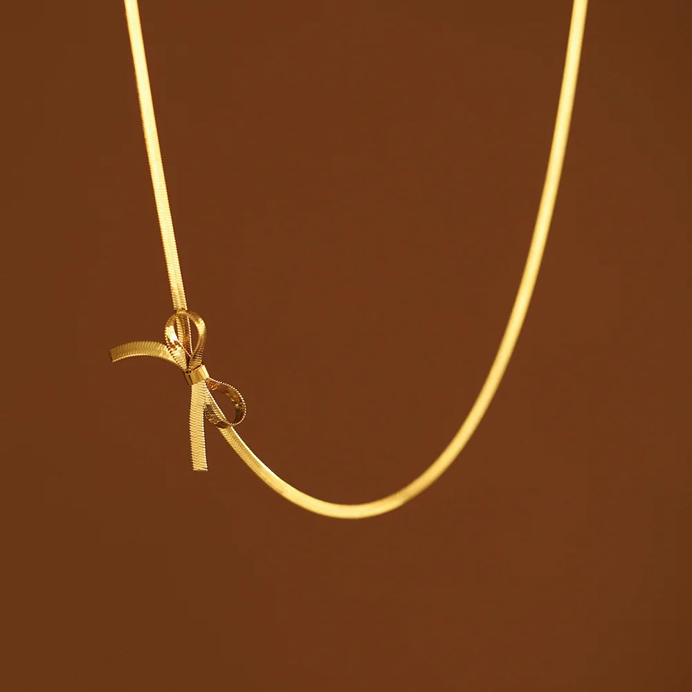 Yiwu DAICY Simple Design 18K Gold Snake Chain Necklace Titanium Steel Weave Bow Necklace for Women Charm Choker Necklace Jewelry