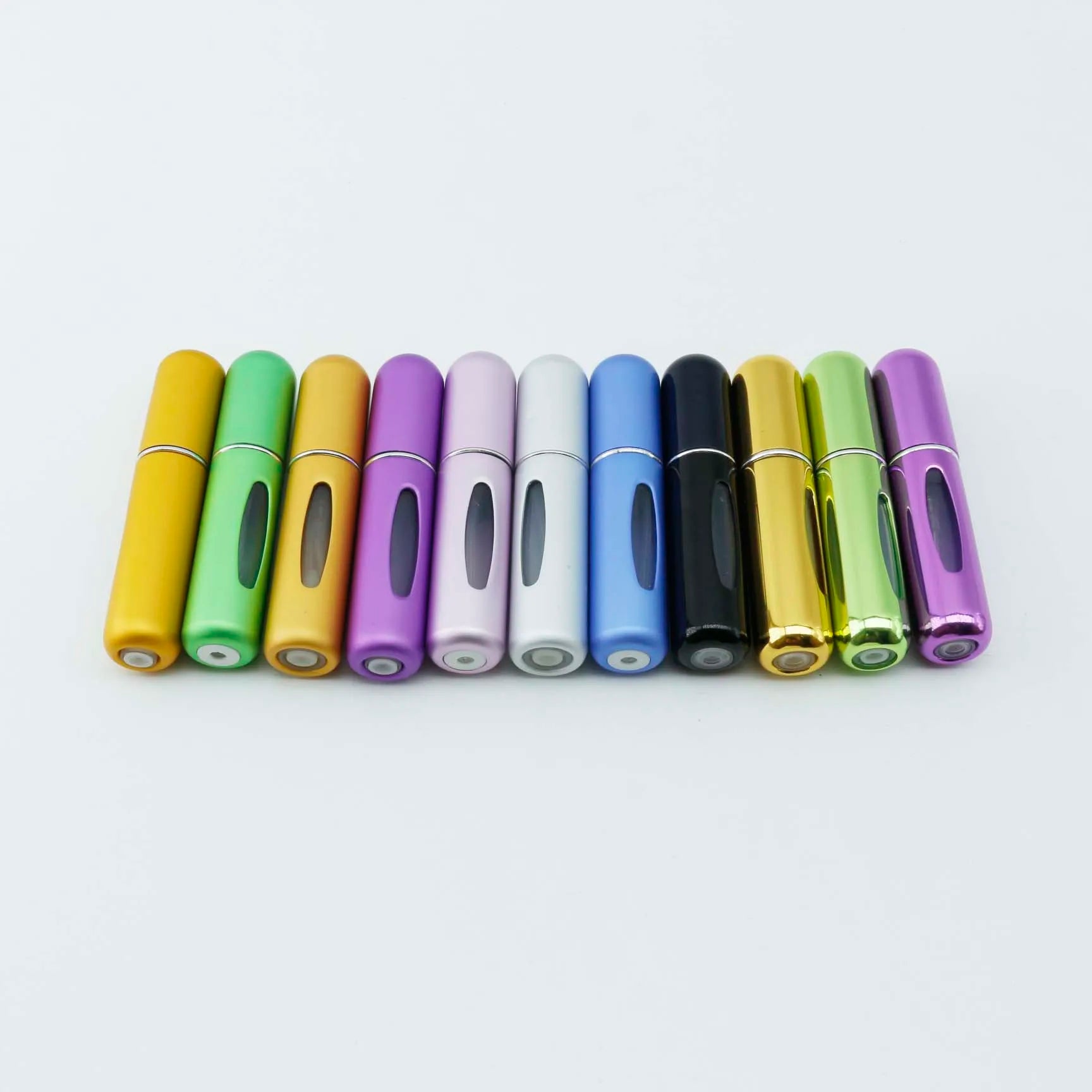 Wholesale Round 5ml Mini Portable Travel Refillable Aluminum Metal Perfume Essential Oil Atomizer Custom Spray Bottle
