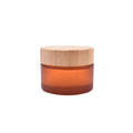 2024 Luxury 50g Frosted Amber Glass Cosmetic Container Empty Glass Cream Jars with Bamboo Lid for Skin Care Face Cream Eye Cream