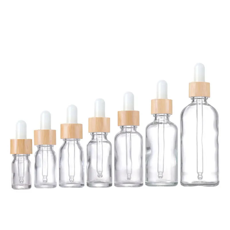 in Stock Clear Glass Oil Dropper Bottle 5ml to 100ml Sizes with Bamboo Dropper for Essential Oils and Face Creams