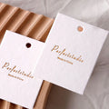 Wholesale Price Texture Cotton Garment Tags for Clothes Custom Printing logo Embossed Design Round Shape Paper Swing Tag