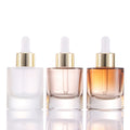 New Glass Serum Dropper Bottle 30ml Custom Brown Flat Shoulder Dropper Bottle for Essential Oils Liquid Foundation