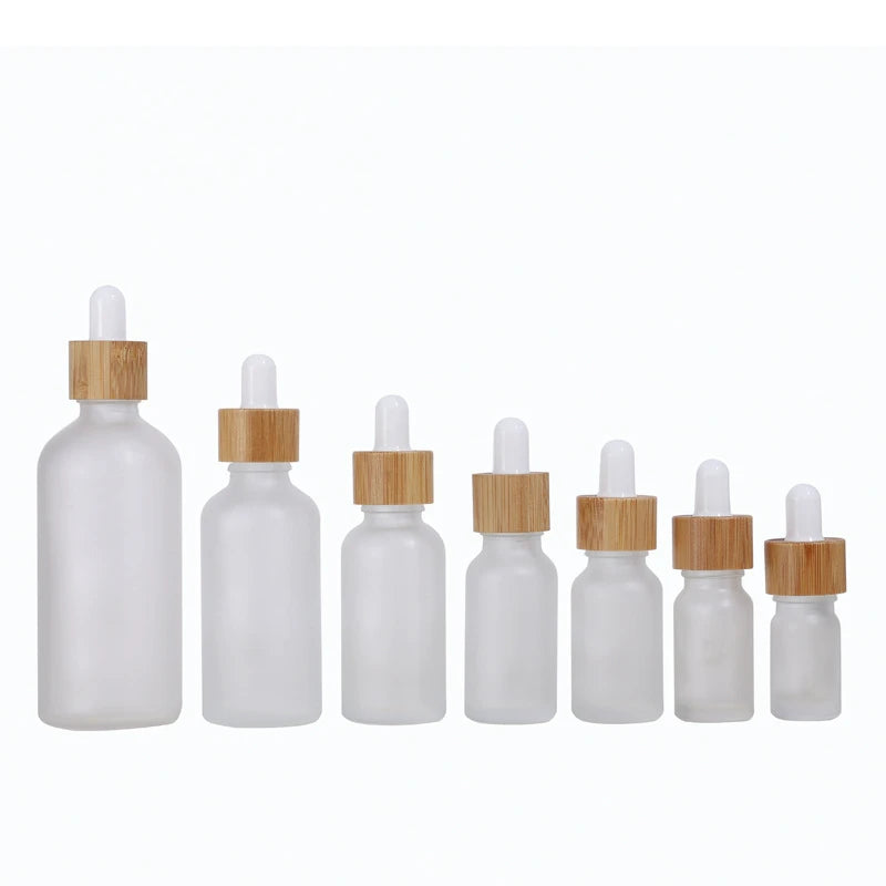 Unique Empty Cosmetic Containers 5ml 15ml 20ml 30ml 50ml 100ml Essential Oil Frosted Glass Dropper Bottles with Bamboo Collars